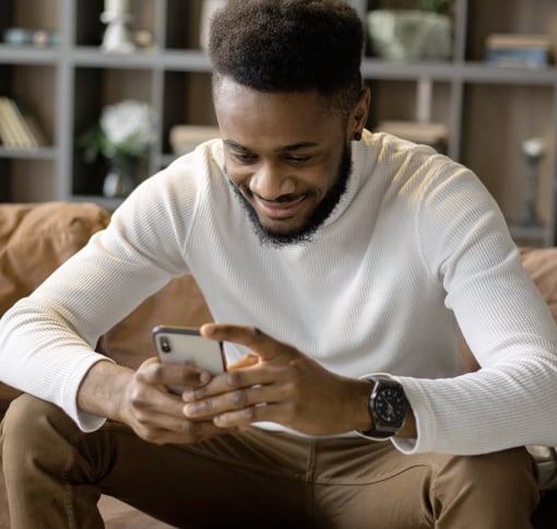 Man texting on his smartphone