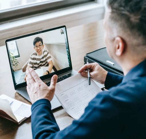 Two men in an online meeting